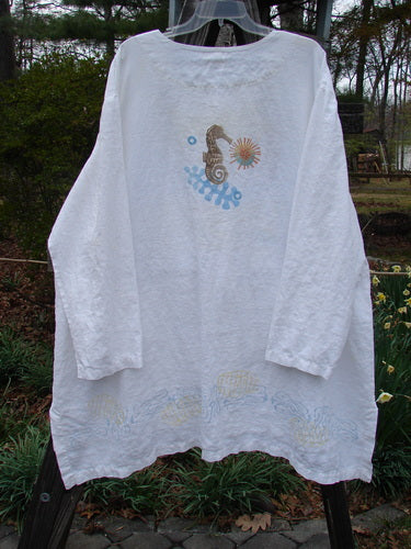 2000 Linen Beach Cardigan Seahorse White Size 2: White shirt with seahorse design, medium weight linen, deep front pockets, oversized buttons, A-line sweep, shirt tail hemline, vintage collection piece from Bluefishfinder.com.