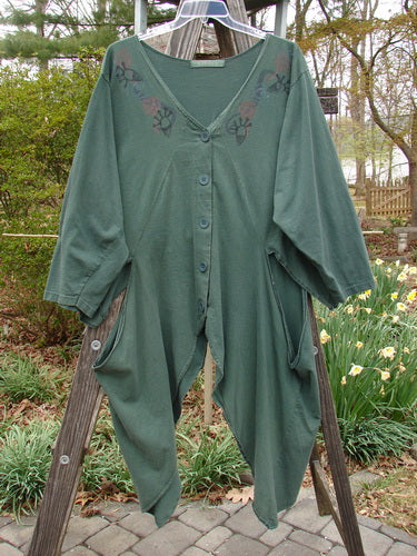 1994 Calligrapher's Jacket Abstract Deep Sea OSFA displayed on a wooden rack, highlighting its wide painted neckline, long open side vents, and diagonal front sectional panels.