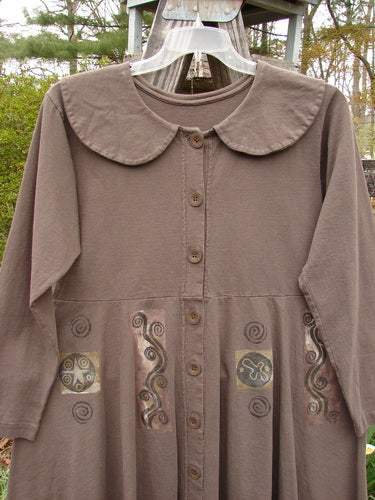 1994 Poppy Dress Belief Spirit Magic Humus Size 1 features a sweet rounded collar, empire waist, vintage pressed paper buttons, and a full sweeping skirt with detailed belief spirit magic theme paint.