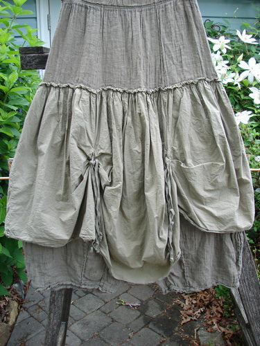 Barclay Linen Batiste Fusion Pant Skirt in Unpainted Wheat Size 0, showcasing a full elastic waistline, dual ties, and a layered design, embodying BlueFishFinder's vintage, creative expression style.