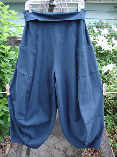 Barclay Cotton Lycra Fold Over 4 Square Pocket Pant in Navy, showcasing a unique 3D diamond cut from knee down, fold-over waistline, double exterior pockets, and detailed stitchery, embodying BlueFishFinder's vintage style.