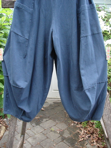 Barclay Cotton Lycra Fold Over 4 Square Pocket Pant in Navy showcases a distinctive 3D diamond cut from knee down, fold-over waistline, billowy bottoms, and double exterior pockets, embodying BlueFishFinder's vintage style.