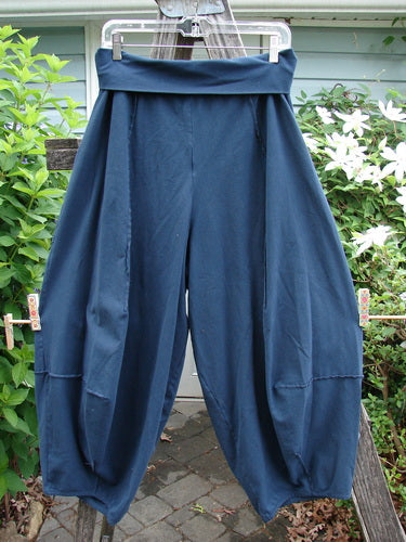 Barclay Cotton Lycra Fold Over 4 Square Pocket Pant Unpainted Navy Size 0 features a fold-over waistline, unique 3D diamond shape from knee down, double exterior pockets, and intricate stitchery.