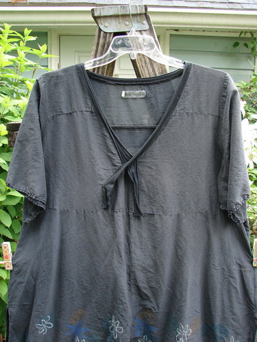 Barclay Batiste Deep Neck Sailor Tie Tunic Daisy Black Size 2 in silk batiste, features a deep V-neck with contrasting fabric, raw-edged widening hemline, and A-line flair with daisy theme.
