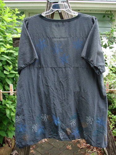 Barclay Batiste Deep Neck Sailor Tie Tunic Daisy Black Size 2, featuring a deeper V neckline, widening hemline with raw edges, and sweet A-line flair, embodies vintage Blue Fish creativity.