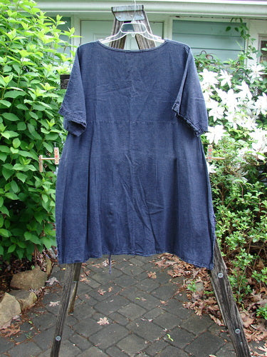 Barclay Hemp Vented Drawcord Dress Moon Night Denim Size 1 features a rounded neckline, kangaroo pocket, empire waist, vented sides, and painted wide sleeves, embodying BlueFishFinder's vintage, expressive style.
