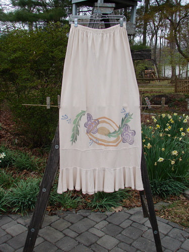 1996 NWT Spring Laughter Skirt Five Petal Birch Bark Size 2 hanging on a clothesline, showcasing its floral design and full elastic waistband.