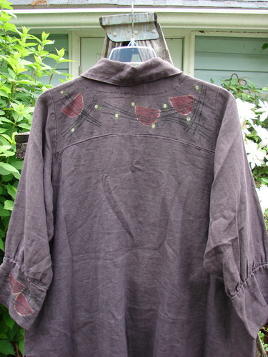 Barclay Linen Metal Button Drop Pocket Jacket Floral Reach Brum Size 2 features billowy sleeves with painted cuffs, metal buttons, elastic loops, double drop pockets, and vented sides, crafted from heavier weight linen.