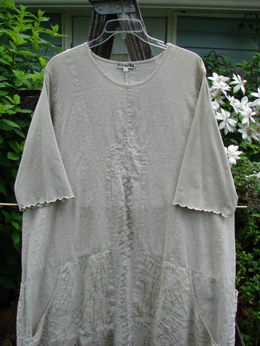 Barclay Linen Farmer Jen Dress Moon Path Flaxen Size 2 features a sectional bodice, paneled hem, drawcord sides, and lettuce-edged sleeves, embodying BlueFishFinder's vintage, creative style.