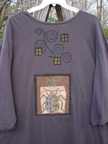 Barclay PMU Patched Big Square Over Top Home Beetle Currant Size 3 features a unique hand-painted beetle design, three-quarter belled sleeves, and a generous, oversized fit with drop shoulders.