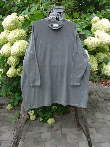 1999 Cotton Lycra Square Mock Pullover Unpainted Black Stripe Size 2, displayed on a hanger, showcases a loose, oversized fit with long sleeves and a stand-up mock turtleneck, highlighting its distinctive boxy shape.