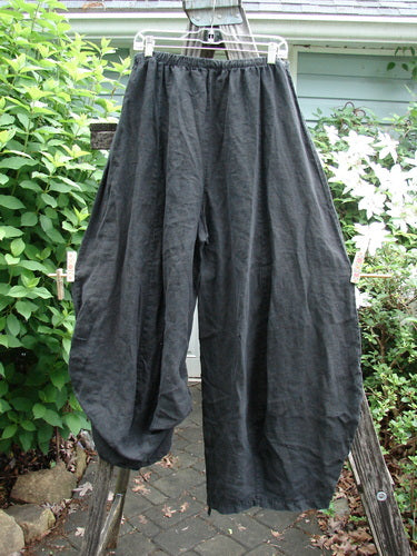 Barclay Linen Tie Bottom 4 Square Pant Unpainted Black Size 2, showcasing a unique 3D diamond cut from the knee down with a front drawstring and elastic back waist, mid-weight linen fabric.