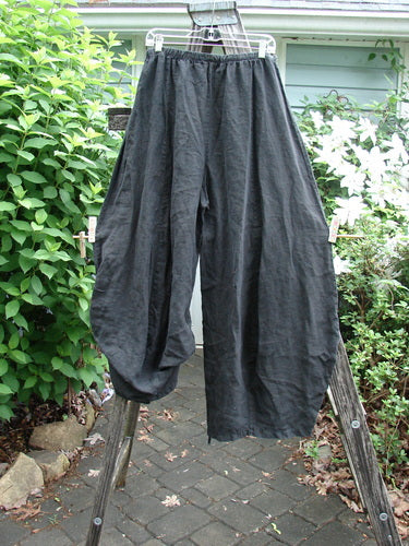 Barclay Linen Tie Bottom 4 Square Pant in Black, Size 2, features a unique 3D diamond cut from knee down, elastic waist, and drawstring front, perfect for summer movement.