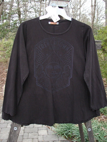 Barclay NWT Long Sleeved Cafe Tee Subtle Sun Frenchtown Black Cherry Size 1, featuring a face design on the front, rounded neckline, long cozy sleeves, and curled edgings.