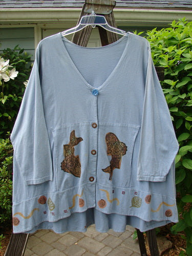 1993 Modernismo Cardigan Koi Periwinkle OSFA: A blue shirt with fish painted on it, featuring a koi pond theme, old time buttons, and a drawcord back.