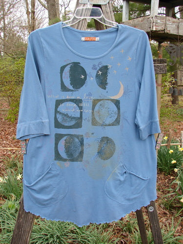 Barclay Banded Sleeve Twinkle Pocket Top Van Gogh Moon Peacock Size 1, featuring a moon and stars design, rounded neckline, double exterior pockets, and three-quarter length sleeves with banded lower.