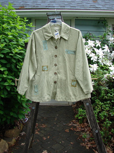 2001 NWT P3 Top Junk Drawer Kelp Size 0, features a swing style, rounded hemline, six abalone shell buttons, tailored back, and Blue Fish 2001 stamp, exuding vintage Blue Fish charm.