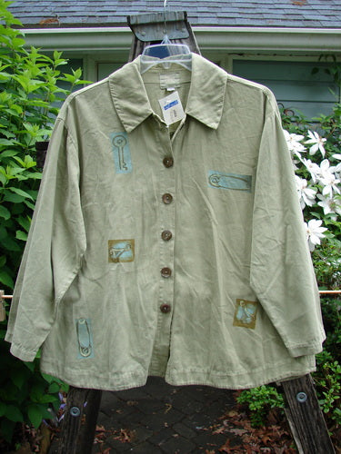 2001 NWT P3 Top Junk Drawer Kelp Size 0, showcasing a unique swing design with six rounded abalone buttons, rounded hem, and tailored back. Signature Blue Fish stamp highlights its vintage charm.