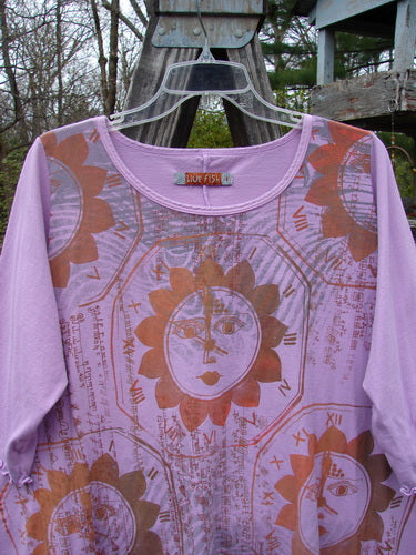 Barclay Three Quarter Sleeved Crop A Lined Tee Sun Guy Mottled Peony Size 1, featuring a sun face design with sweet curly edgings and a rounded, rolled neckline.