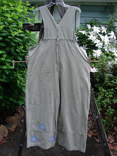 2000 Parachute Overall Pant Jumper Floral Eucalyptus Size 1 featuring oversized painted front bib pocket, deep carpenter pockets, sturdy shoulder straps, jet black buttons, wide swingy panels, and drawcord back.