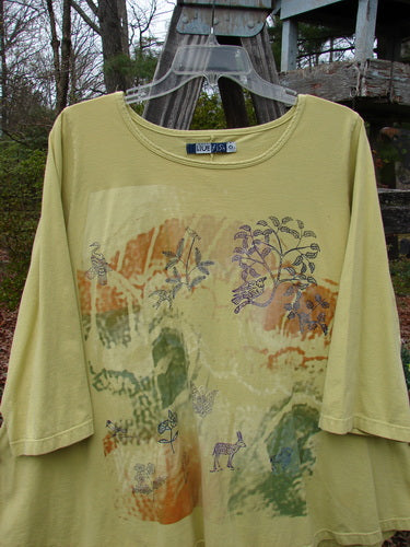 Barclay Three Quarter Sleeved A Lined Tee Garden Friends Mottled Plantain Size 0 featuring a deer and floral design on the front, with a rounded neckline and curly edgings.