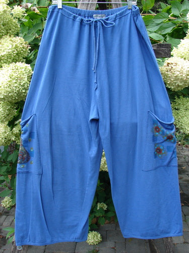 Barclay Drawstring Double Pocket Pant Shop Purse Skylark Size 2 features loose-fit, ankle-length blue trousers with drawstring waist, large floral motif pockets, embodying vintage charm from BlueFishFinder's creative, expressive collection.