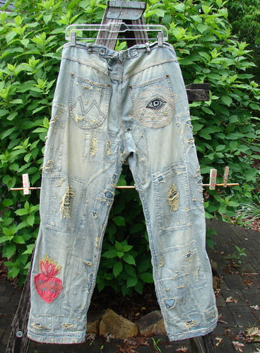 Magnolia Pearl NWT Guadalupe Love Ranchero Miner Jean in Washed Indigo features adjustable rear buckle, full button fly, rear embroidery, distressed edges, hand mending, and generous leg width, embodying Bluefishfinder.com's distinctive vintage style.