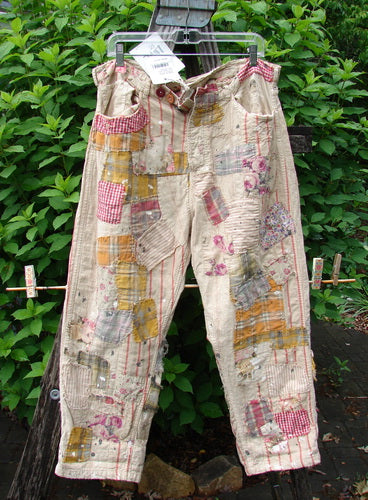 Magnolia Pearl NWT European Cotton Patchwork Miner Jean Encore OSFA, featuring adjustable button fly and waist, textured stitching, significant distressing, contrasting patches, and signature rear patched pocket, embodies Bluefishfinder's vintage aesthetic.