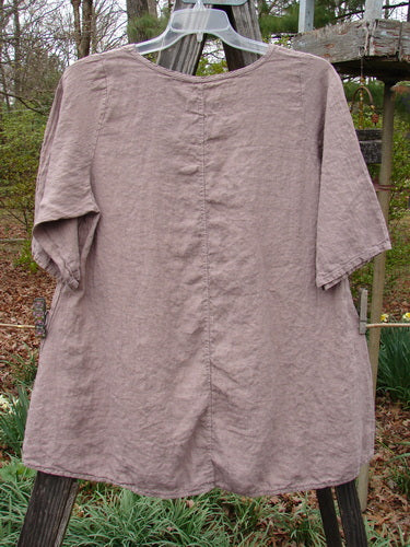 Barclay Linen Lucida Top Whisper Wheat Sprig Mauve Size 0, featuring a rounded neckline, flowy A-line shape, and almost three-quarter sleeves, captured in a close-up showcasing its intricate pattern.