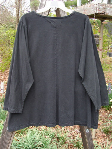 Barclay NWT Long Sleeve Studio Tee Mixed Metallic Mosaic Black Size 0 displayed on a clothes rack, featuring a three-quarter sleeve and an A-line shape.