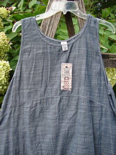 Barclay NWT Light Weight Chambray Shift in Stripe Blue Light, size 0, displayed on a hanger, features a unique hem, scoop neckline, and widening lower shape, perfect for a linear mid-layer flow.