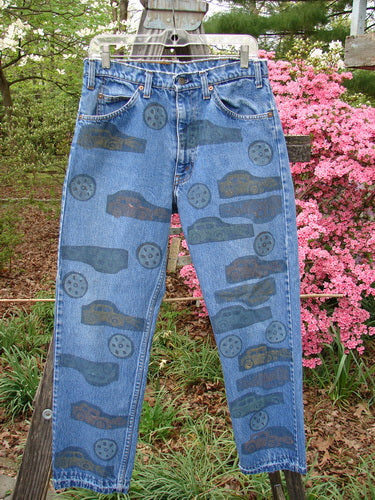 1995 Levi Strauss & Co Denim Blue Jean Travel Dark Stone Wash Size 1 featuring car designs, front and rear pockets with Levi's orange tag, and a blue fish patch on the waistline.