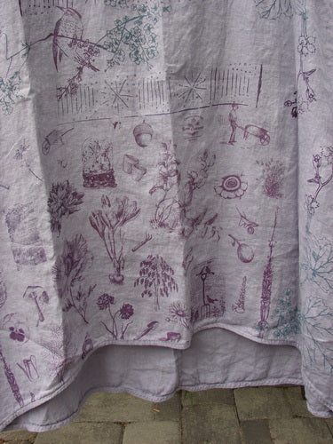 Barclay NWT Linen Sundress Garden Folly Amethyst Size 0 features a light-gray fabric with muted purple and teal gardening-themed sketches, including bulbs, flowers, and tools, embodying Bluefishfinder's creative, individualistic spirit.