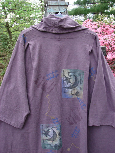 1994 Reprocessed Carriage Jacket Star Moon Fuji Purple Altered OSFA featuring a wide billowy collar, deep side pockets, oversized vintage buttons, and a celestial design with moon and stars.
