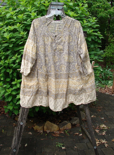 Magnolia Pearl European Cotton Block Print Briar Tunic Top Flower Child OSFA features a Henley snap button combo, raw edges, A-line shape, continuous print, and dual inseam side drop pockets.