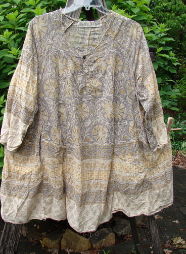Magnolia Pearl European Cotton Block Print Briar Tunic Top Flower Child OSFA features raw edges, dual inseam pockets, and a Henley snap button design, showcasing a softly blended print with an A-line shape.