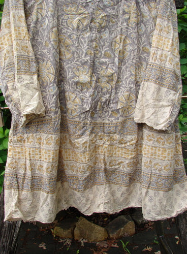 Magnolia Pearl European Cotton Block Print Briar Tunic Top Flower Child OSFA features raw edges, A-line shape, and dual side pockets, showcasing a softly blended print with Henley snap button detail.