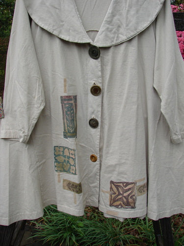 1994 Wanderer's Jacket Mindful Mosaic Mist Altered Size 1 featuring a large shawl collar, buttons, and unique sectional side inserts for added flair and movement.