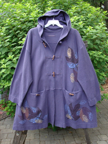 1998 Berber Hooded Bracken Jacket Midnight Leaf Size 2 featuring a hood, sectional front pocketed panels, twig toggle buttons, and a unique oversized leaf theme paint.