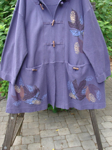 1998 Berber Hooded Bracken Jacket Midnight Leaf Size 2, featuring a floral design, twig toggle buttons, sectional front pockets, and an oversized hood.