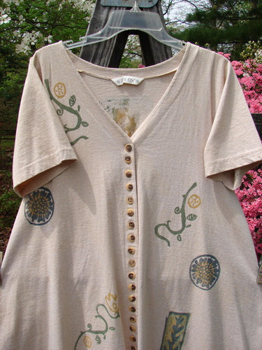1995 Tiny Button Dress featuring a fruit and floral garden design with a swingy hem and numerous tiny buttons, showcasing a feminine hourglass shape and V neckline, perfect for vintage fashion enthusiasts.