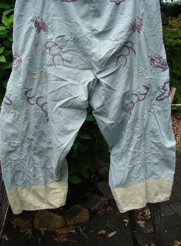 Magnolia Pearl NWT Cotton Satin Embroidered Alyce Dragon Pant Big Sky OSFA features intricate embroidery, lightweight cotton satin, and a relaxed fit, epitomizing Bluefishfinder's unique, expressive vintage clothing ethos.