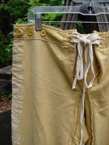 Magnolia Pearl Embroidered Heavy Cotton Whistlestop Underjohn Canary OSFA showcases intricate embroidery on durable European cotton fleece, embodying Bluefishfinder.com's ethos of vintage-inspired, expressive women's fashion.