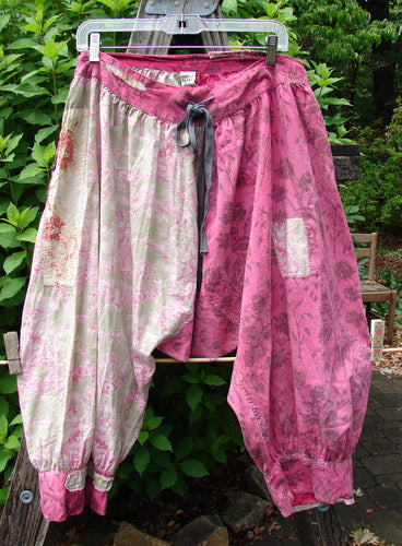 The Magnolia Pearl European Cotton Patched Kiki Bloomer Betsy J. OSFA features mixed side buttons, a drawstring waist, billowy hips, and sweet cuffs, embodying a vintage-inspired, artistic flair.