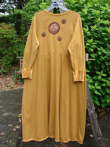 1996 Velvet Ornamental Pocket Dress Celtic Center Gold Size 2, featuring a velvet-accented neck, hem, and sleeve trim, with a dramatic hand-painted purse and A-line shape, embodies Bluefishfinder.com's vintage aesthetic.