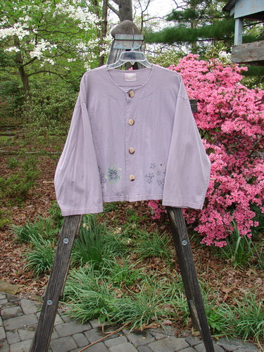 2000 Wide Crop Jacket Dance Flower Hyacinth Size 0 displayed on a hanger, showcasing its A-line flair, front variegated buttons, and distinctive downward curved rear drawcord.