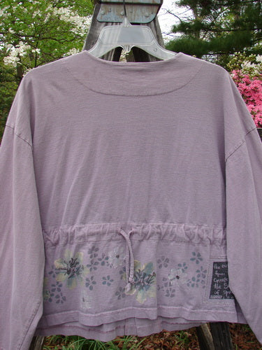 2000 Wide Crop Jacket Dance Flower Hyacinth Size 0 displayed on a hanger, showcasing its long sleeves, variegated buttons, A-line flair, and detailed flower border theme.