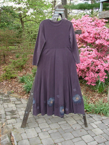 1998 Rib Top Dress Circle Floral Morado Size 1 displayed on a rack, showcasing a thickly ribbed upper bodice, empire waist seam, and sweeping hemline with a superior circle floral theme.