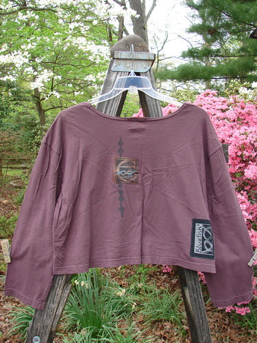 2000 Kell's Top Celtic E Loam Size 1 displayed on a hanger, featuring a shorter, boxier shape with a deep scoop neckline and Blue Fish patch, perfect as an overpiece.