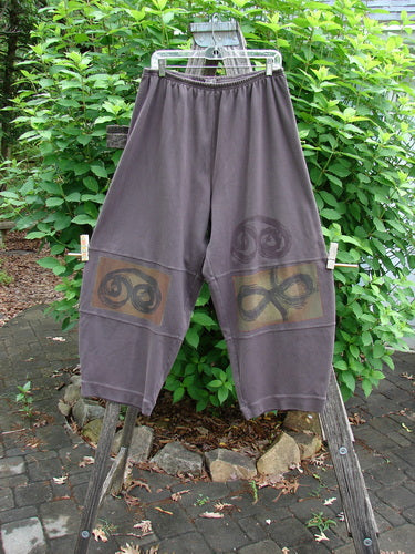 2000 Interlock Moors Pant Celtic Peat Size 2 features a unique pegged lower shape, full elastic waistband, and Celtic-themed design, showcasing the intricate craftsmanship of BlueFishFinder's vintage collection.